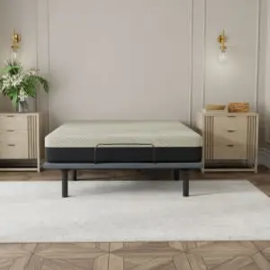 Gel Comfort mattress on a metal frame in a modern bedroom setting with nightstands and decorative plants.